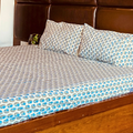 Ocean Bloom hand block printed bedsheet styled on bed, Sanganer block print